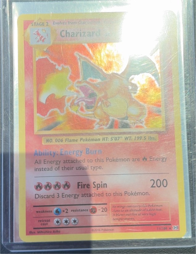 2016 Pokémon XY Evolutions #11 Charizard — front