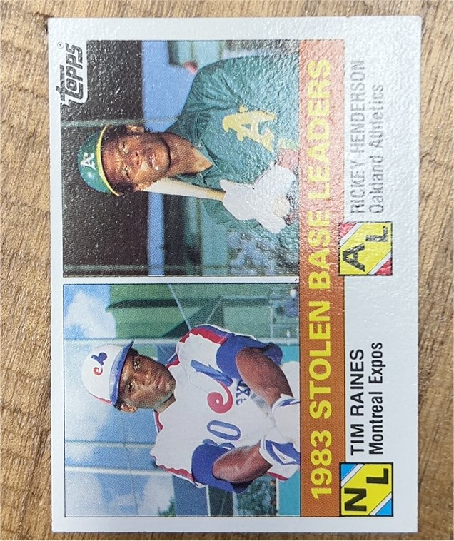 1984 Topps #134 1983 Stolen Base Leaders Rickey Henderson / Tim Raines — front