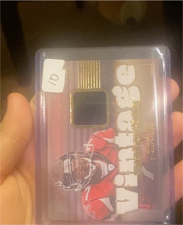 2024 Panini Luminance Vintage Materials #VM-MVK Michael Vick — front