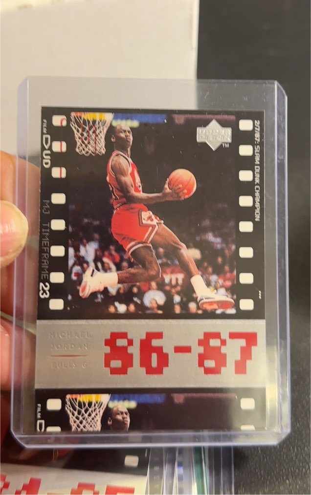 1998-99 Upper Deck Slam Dunk Champion #15 Michael Jordan 86-87 — front