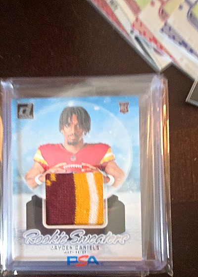 2024 Panini Donruss Rookie Holiday Sweaters #RHS-JDA Jayden Daniels — front