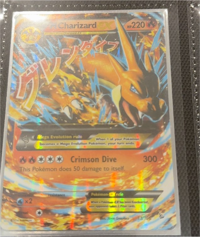 2014 Pokémon TCG Mega Charizard EX #13/106 — front