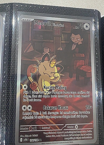 2023 Pokémon SV10 #154 Meowth Team Rocket — front