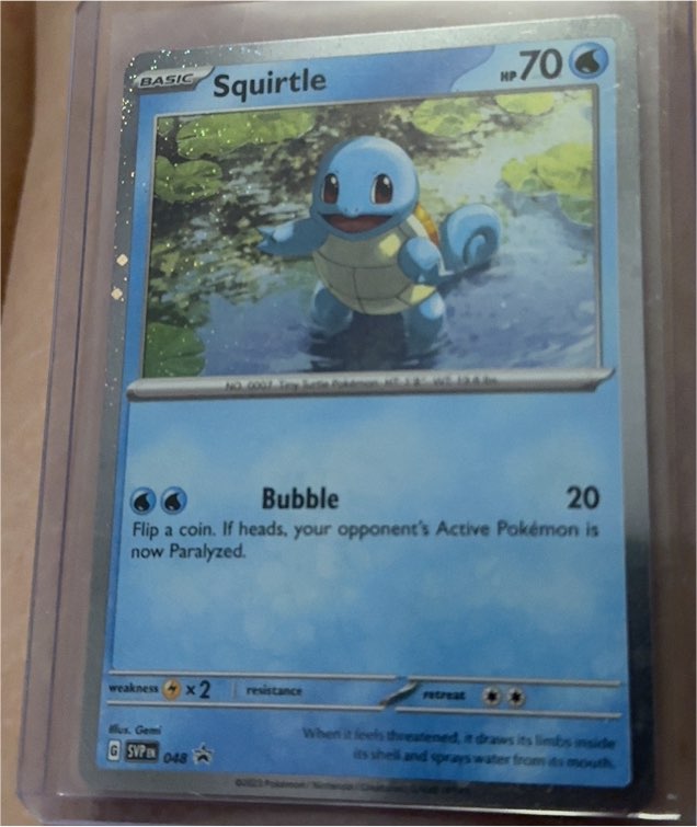 2023 Pokémon Scarlet & Violet Black Star Promo #048 Squirtle Cosmos Holo — front