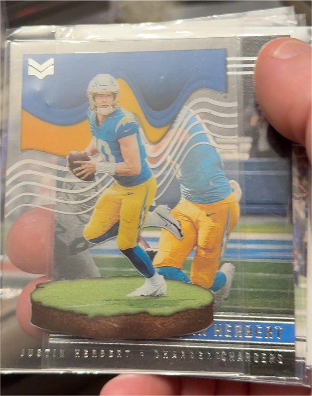 2022 Panini Chronicles Magnitude #MAG-4 Justin Herbert Chargers — front