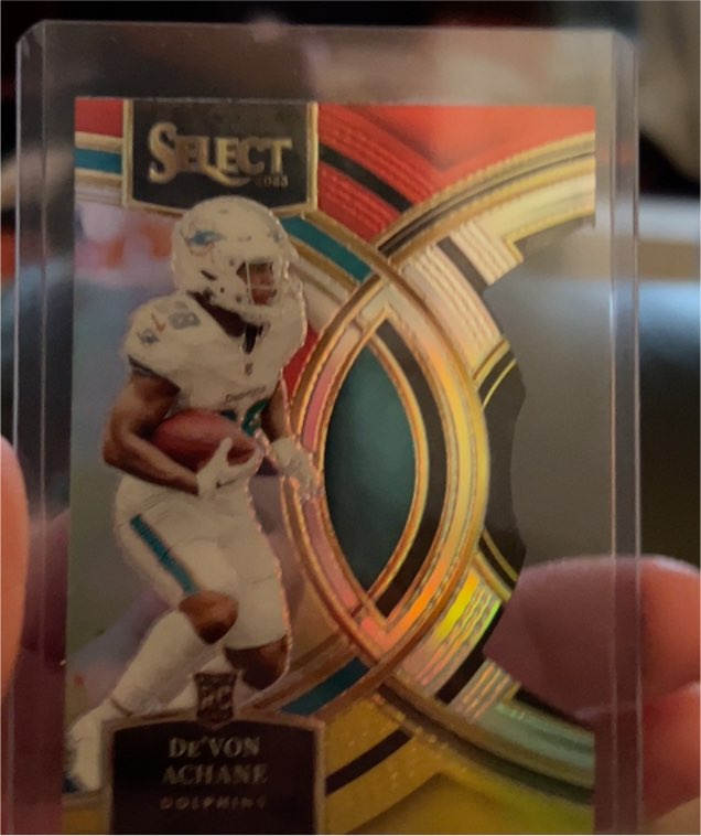 2023 Panini Select Premier Level Red & Yellow Prizm Die-Cut DeVon Achane — front