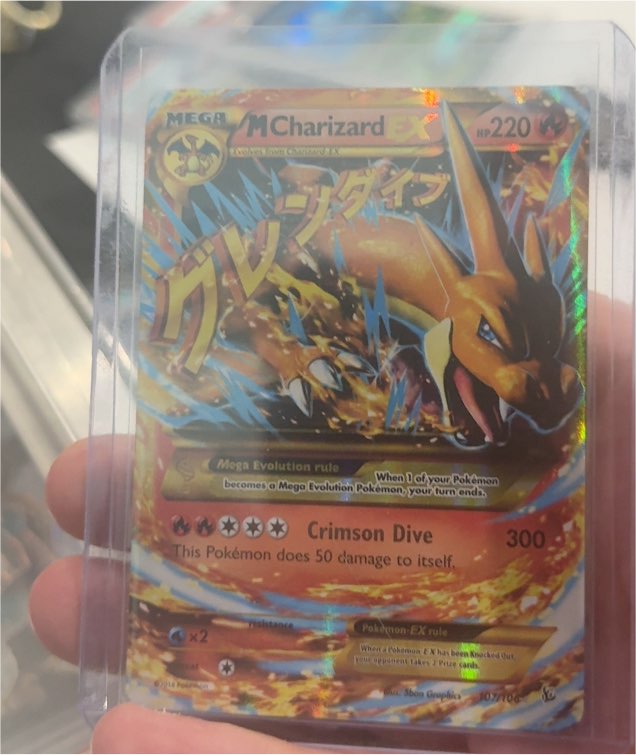 2014 Pokémon XY Flashfire #107/106 M Charizard EX — front