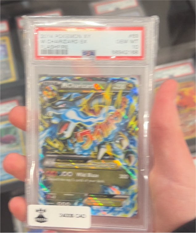2014 Pokémon XY #69 M Charizard EX Flashfire — front