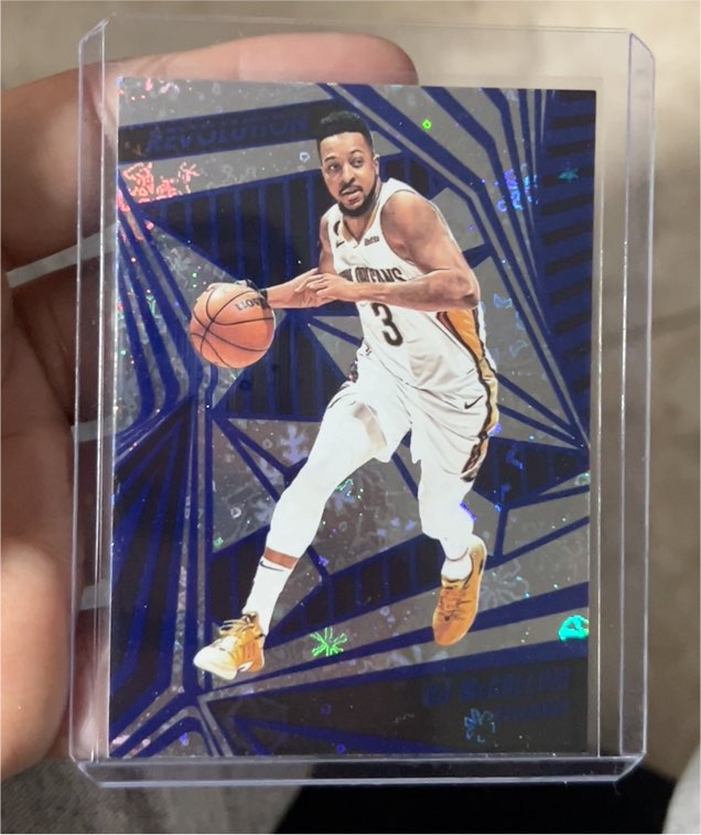 2023-24 Panini Revolution #33 C.J. McCollum — front