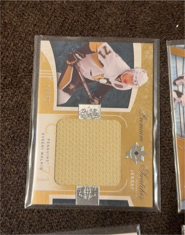 2009-10 Upper Deck Ultimate Collection Premium Swatches #C1 Evgeni Malkin — front