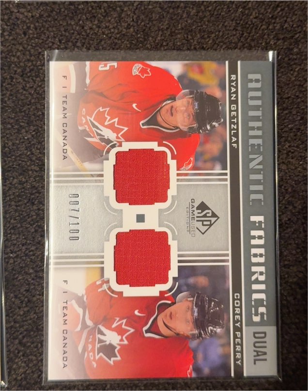 2011-12 SP Game Used Authentic Fabrics Dual #AF2 Ryan Getzlaf/Corey Perry — front