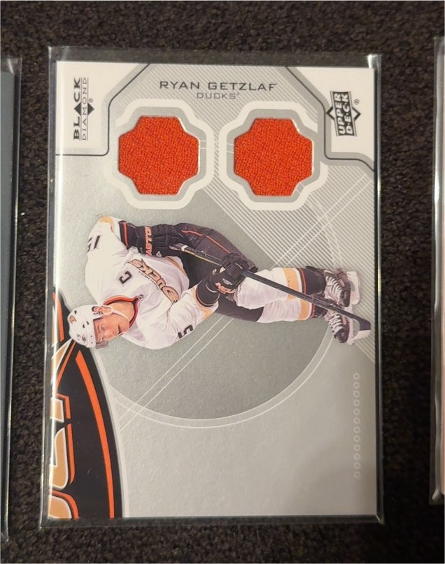 2012-13 Upper Deck Black Diamond Dual Jerseys #ANA-RG Ryan Getzlaf — front