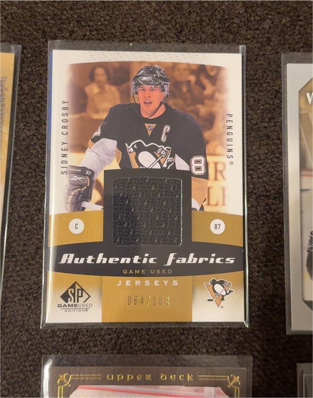 2010-11 Upper Deck SP Game Used Authentic Fabrics #AF-SC Sidney Crosby — front