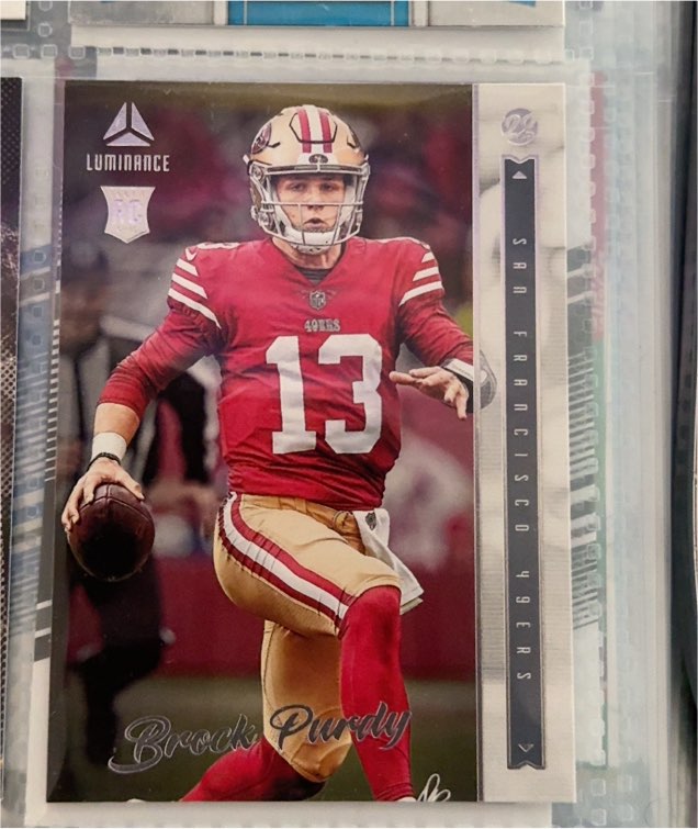 2022 Panini Chronicles Luminance #213 Brock Purdy — front