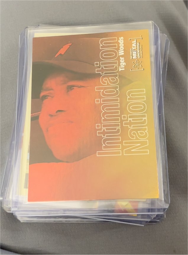2021 Skybox Metal Universe #IN-25 Tiger Woods Intimidation Nation — front