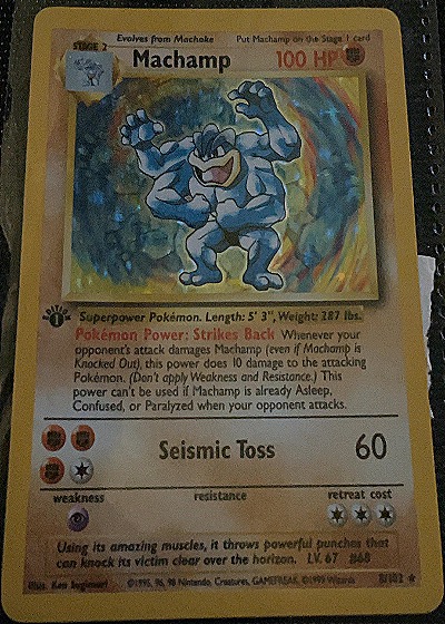 1999 Pokémon Base Set #8 Machamp — front