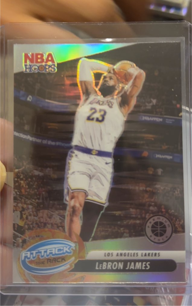 2023-24 Panini NBA Hoops Premium Stock #4 LeBron James Attack the Rack Silver — front