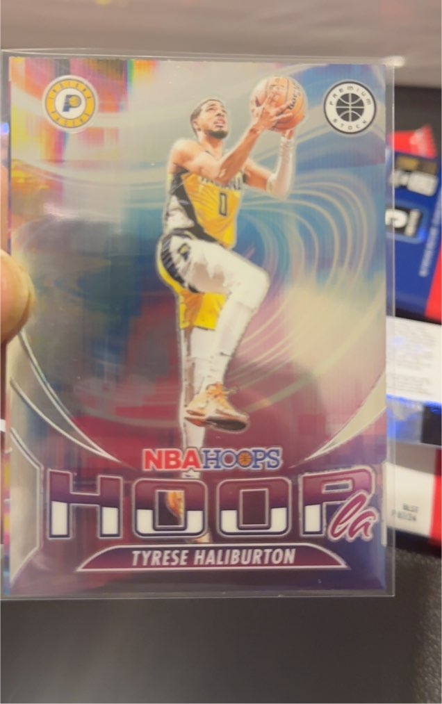 2023-24 Panini NBA Hoops Premium Stock Hoopla #11 Tyrese Haliburton — front