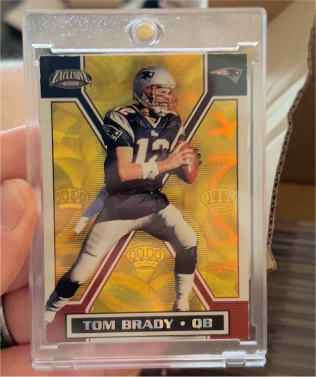 2002 Pacific Exclusive #X Tom Brady — front