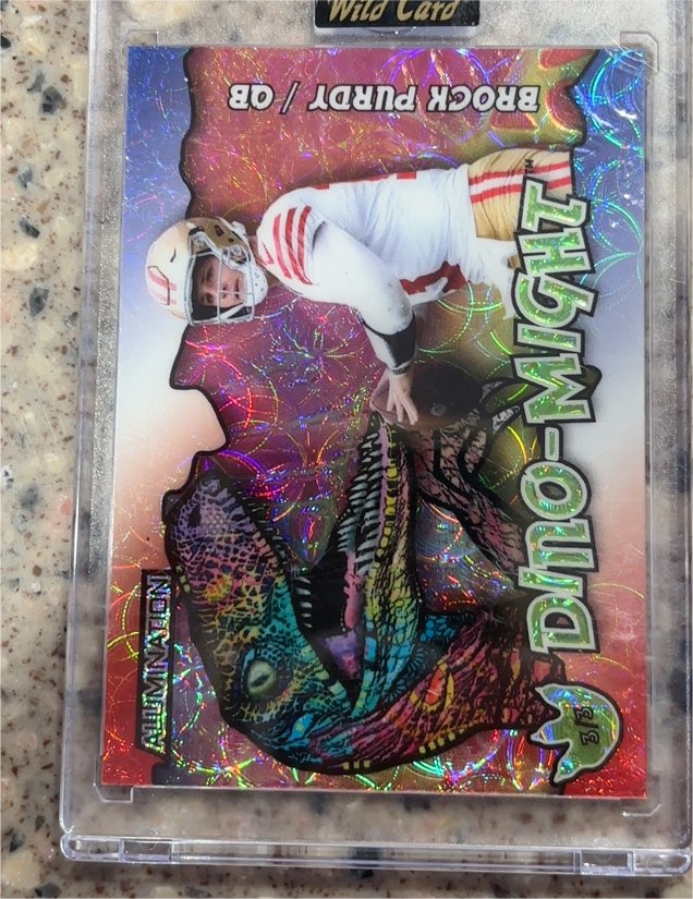 2023 Wild Card Alumination Dino-Might #AD-BP1 Brock Purdy — front