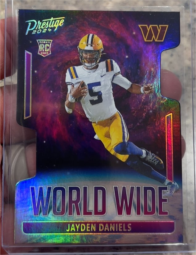 2024 Panini Prestige World Wide #WW-JD Jayden Daniels — front