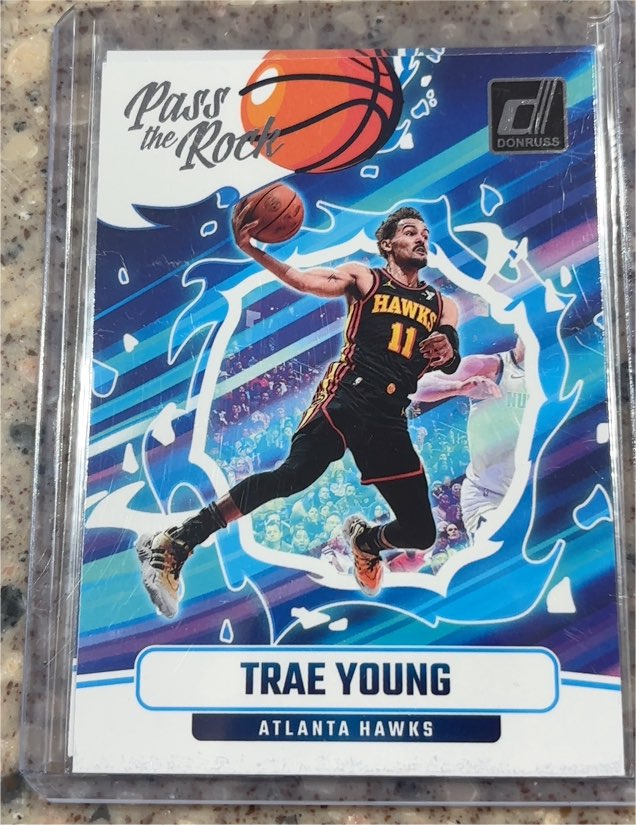 2024-25 Donruss #9 Trae Young Pass the Rock — front