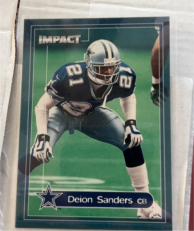 2000 Skybox Impact #180 Deion Sanders — front