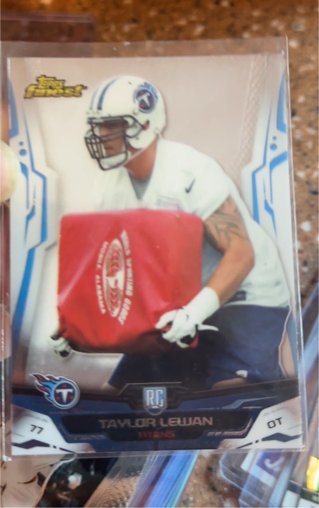 2014 Topps Finest #106 Taylor Lewan Rookie — front