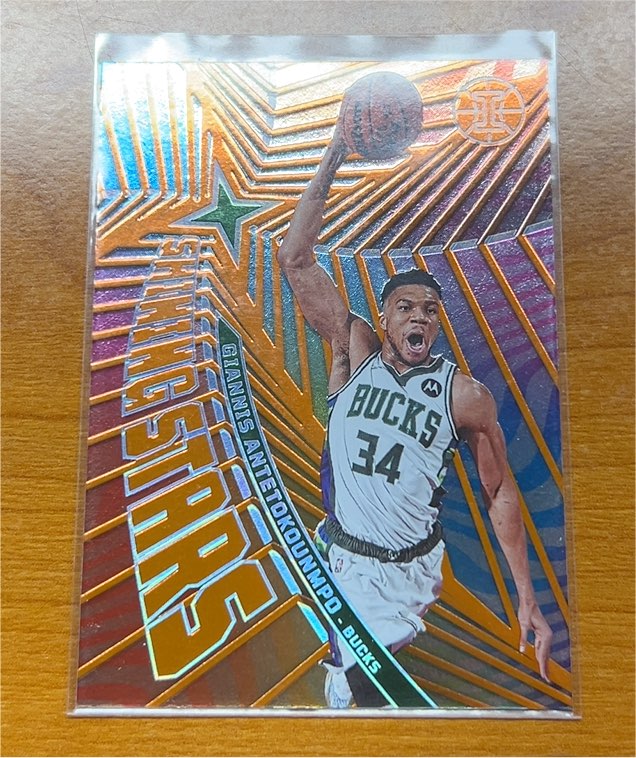 2021-22 Panini Illusions Shining Stars #8 Giannis Antetokounmpo — front