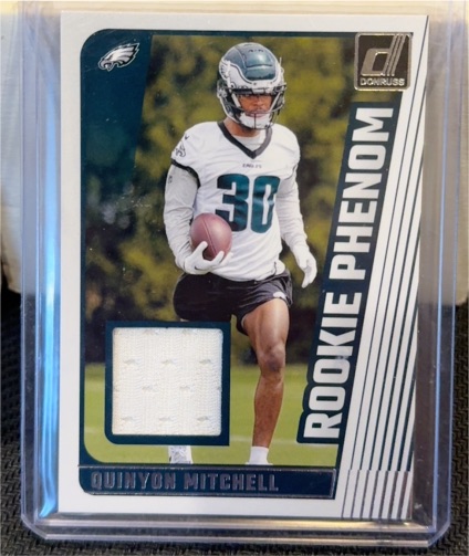 2024 Panini Donruss Rookie Phenom Jerseys #RPJ-QMI Quinyon Mitchell — front