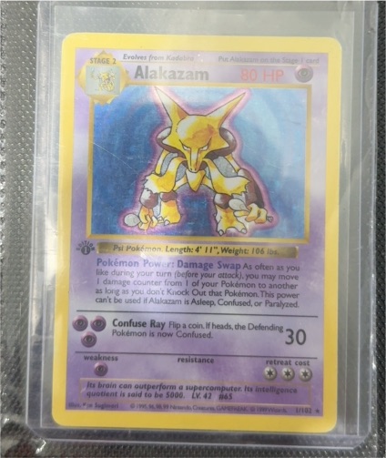 1999 Pokémon Base Set #1 Alakazam — front