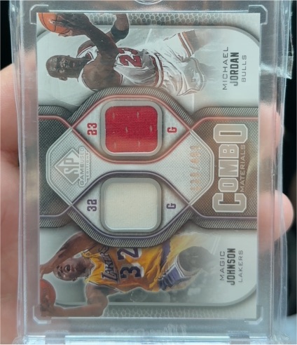 2009-10 Upper Deck SP Game Used Combo Materials #CM-MJ Michael Jordan & Magic Johnson — front