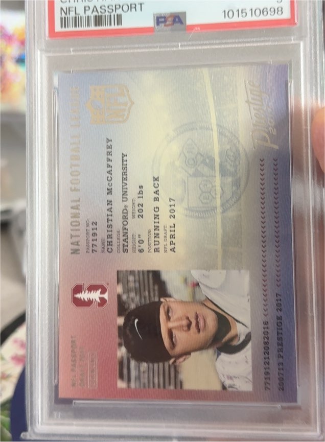 2017 Panini Prestige NFL Passport #12 Christian McCaffrey — front