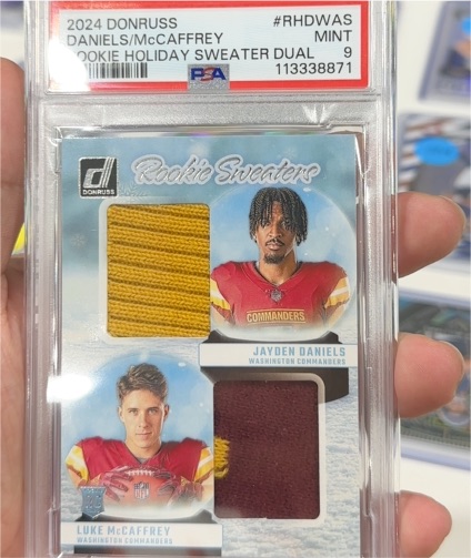 2024 Donruss #RHD-WAS Jayden Daniels/Luke McCaffrey Rookie Holiday Sweater Dual — front