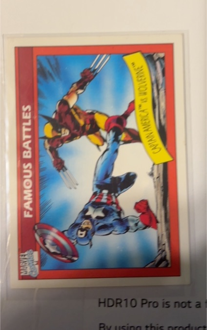 1990 Impel Marvel Universe #115 Captain America vs. Wolverine — front