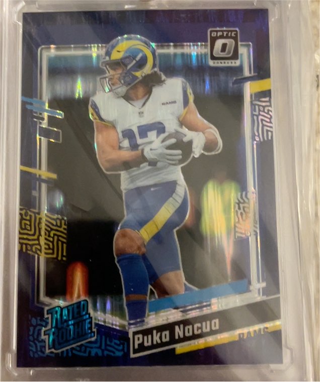 2023 Donruss Optic #238 Puka Nacua Purple Shock Prizm Rated Rookie — front