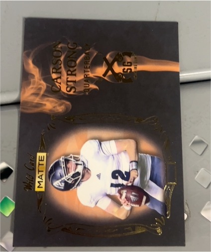 2022 Wild Card Matte #SG-10 Carson Strong Smoking Guns Black/Orange — front