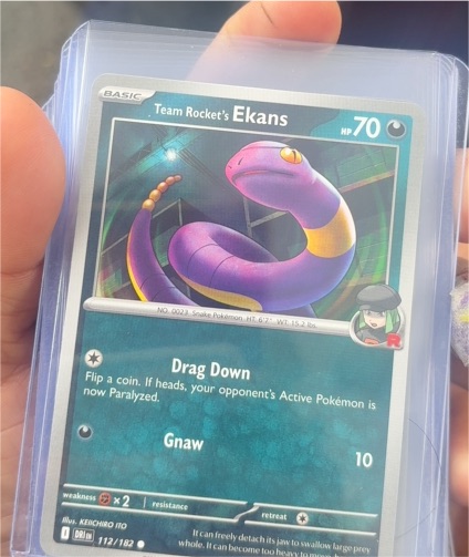 2023 Pokémon TCG Destined Rivals #112 Team Rocket's Ekans — front