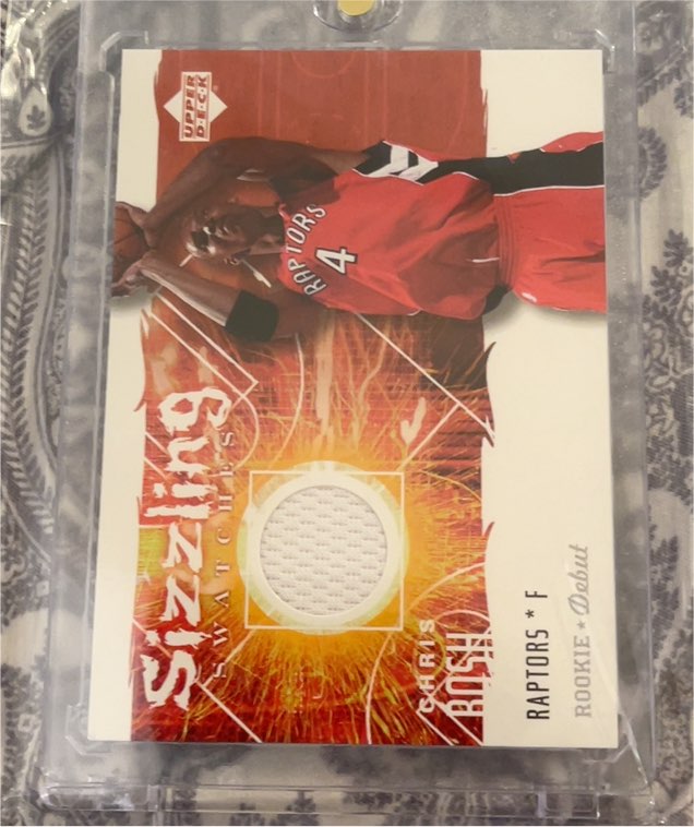 2005-06 Upper Deck Rookie Debut Sizzling Swatches #SS-CB Chris Bosh — front