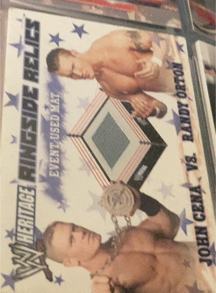 2007 Topps Heritage III WWE Ringside Relics John Cena vs. Randy Orton — front