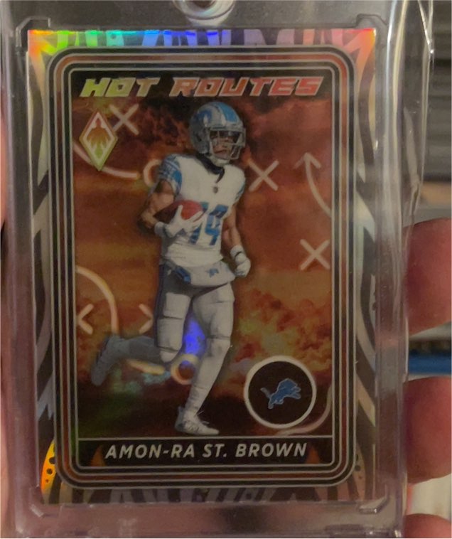 2023 Panini Phoenix Hot Routes #HR-3 Amon-Ra St. Brown — front