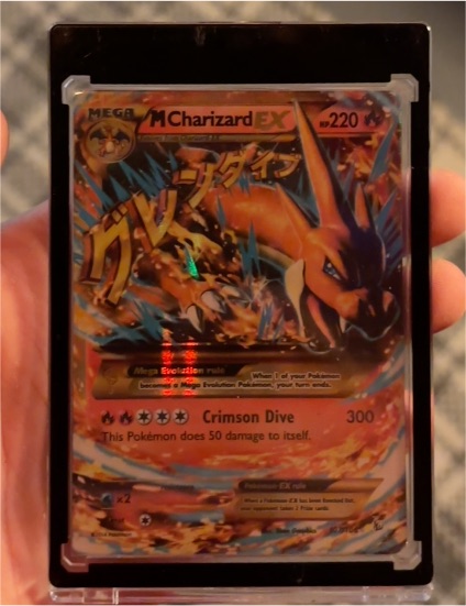 2014 Pokémon TCG Mega Charizard EX #107/106 Flashfire — front