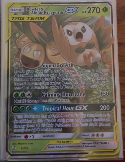 2019 Pokémon Unified Minds #1 Rowlet & Alolan Exeggutor GX — front