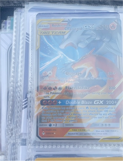 2019 Pokémon TCG SM-Unbroken Bonds #20 Reshiram & Charizard GX — front