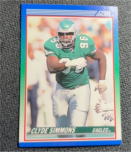 1990 Score #106 Clyde Simmons — front