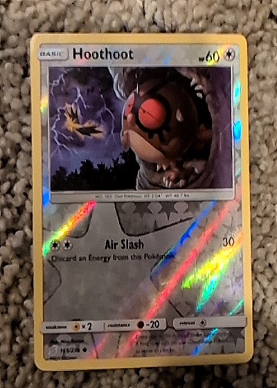 2019 Pokémon Unified Minds #165 Hoothoot Reverse Holo — front