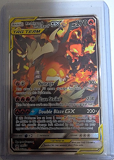 Reshiram & Charizard GX SM201 — front