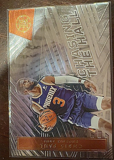 2021-22 Panini Illusions #10 Chris Paul Chasing the Hall — front
