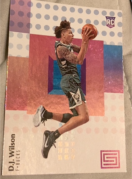 2017-18 Panini Status #114 D.J. Wilson Rookie — front
