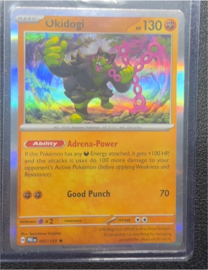 2023 Pokémon TCG Prismatic Evolutions #057 Okidogi — front